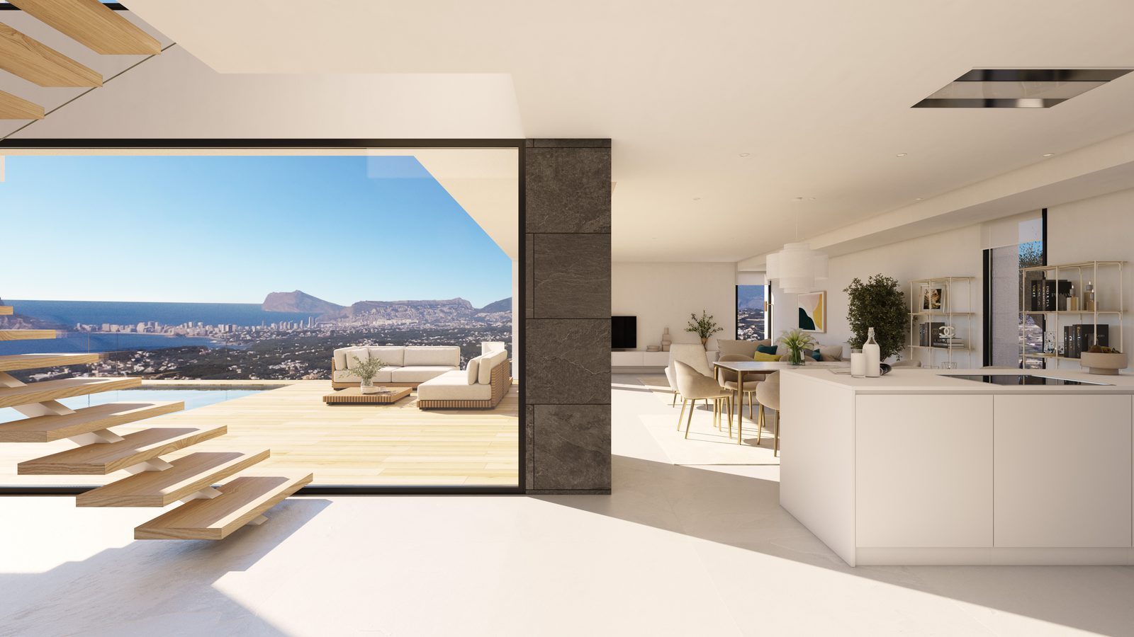 Open-plan kitchen and living area with panoramic sea views of a 3-bedroom villa in Benitachell —