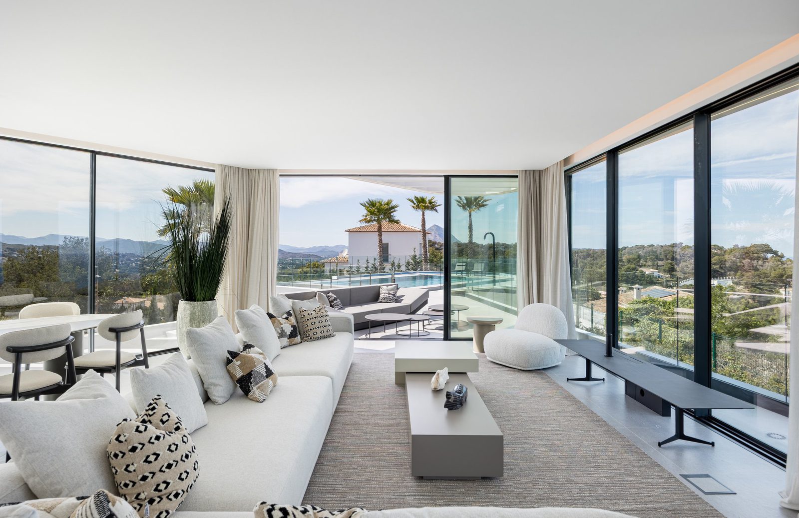 Bright living area with panoramic sea views of a 5-bedroom villa in Portixol - The Estates