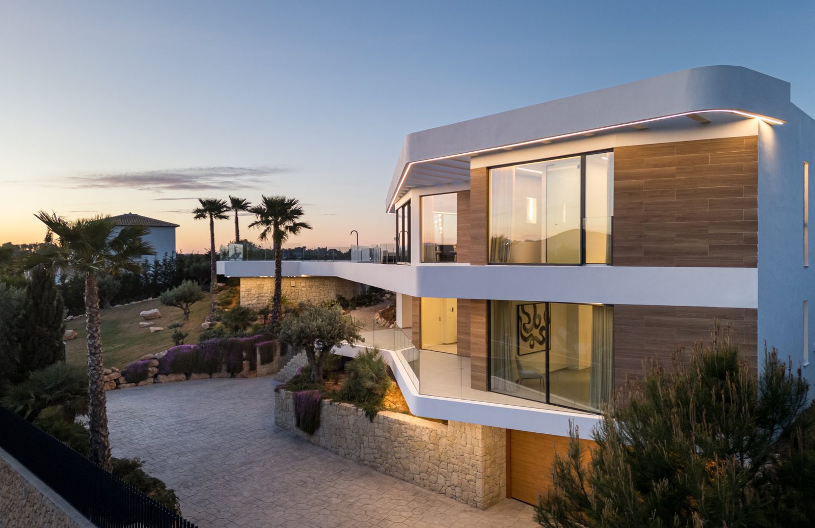 Exterior view of a modern 5-bedroom villa in Portixol with sea views - The Estates