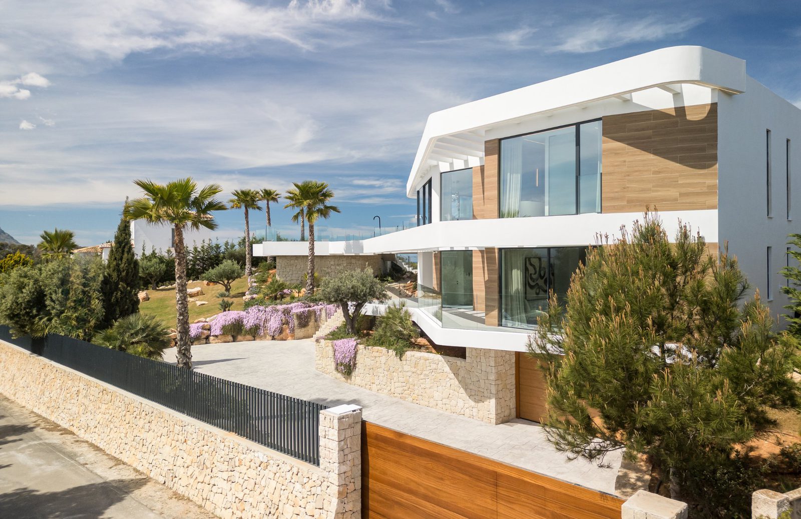 Modern exterior of a 5-bedroom villa in Portixol with sea views - The Estates