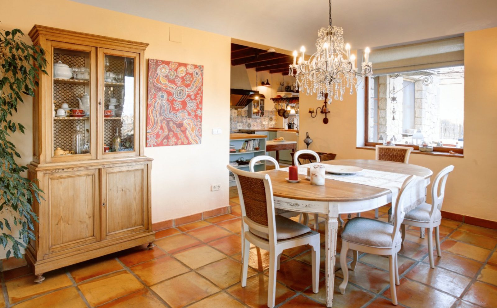 Elegant dining area with chandelier and views in a 4-bedroom finca in Moraira - The Estates