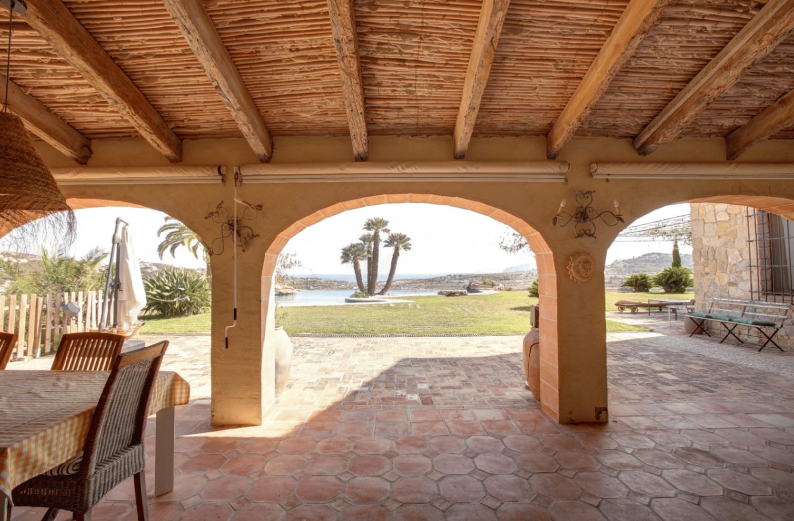 A view through an arched terrace of a 4-bedroom finca in Moraira - The Estates