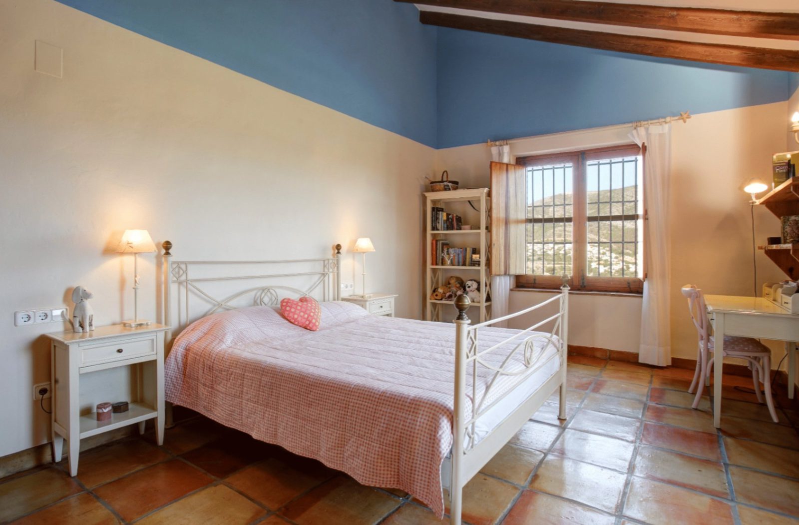 A bright bedroom with a view of the countryside in a 4-bedroom finca in Moraira - The Estates