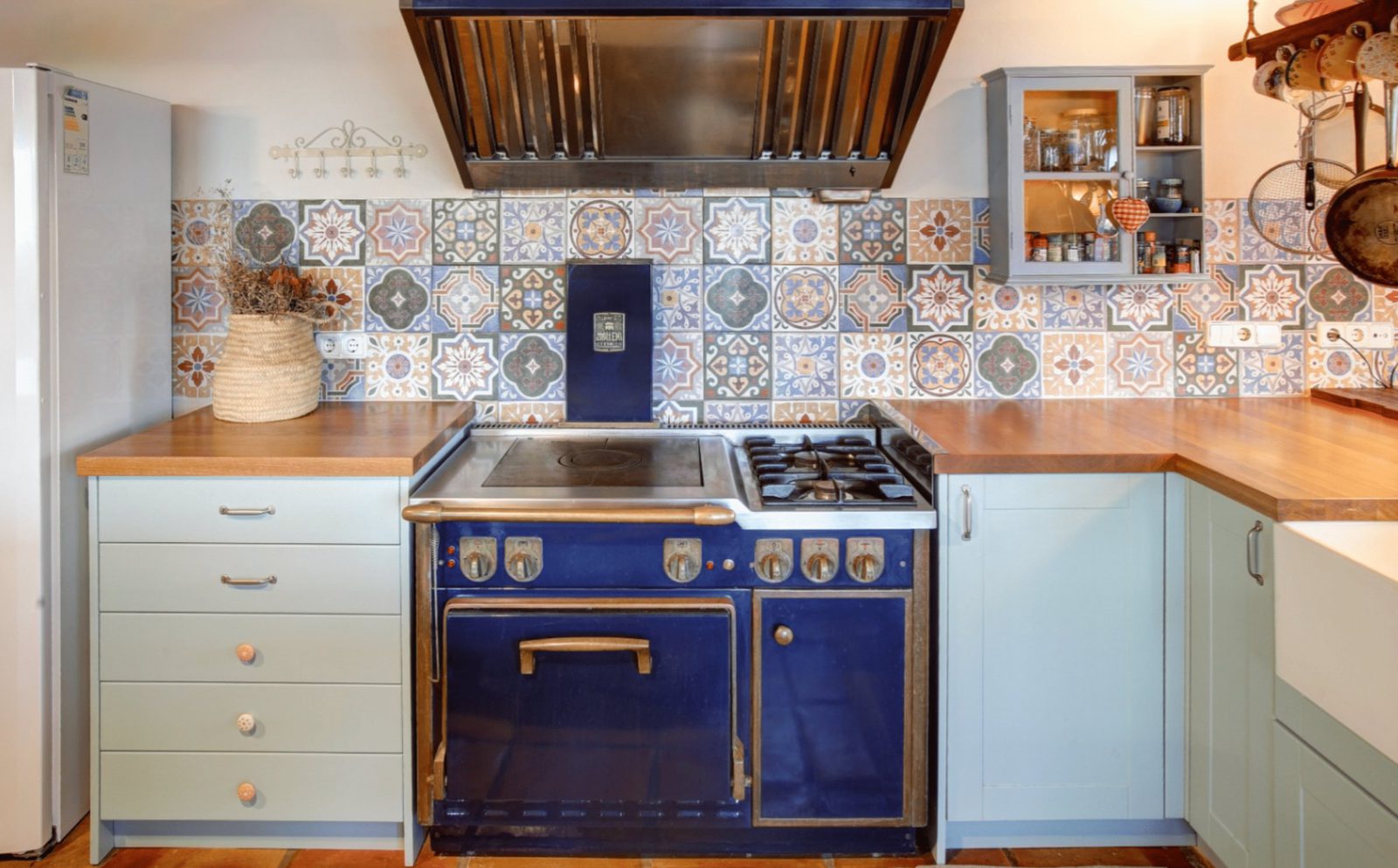 Stylish kitchen with patterned tiles and a range cooker in a 4-bedroom finca in Moraira - The Estates