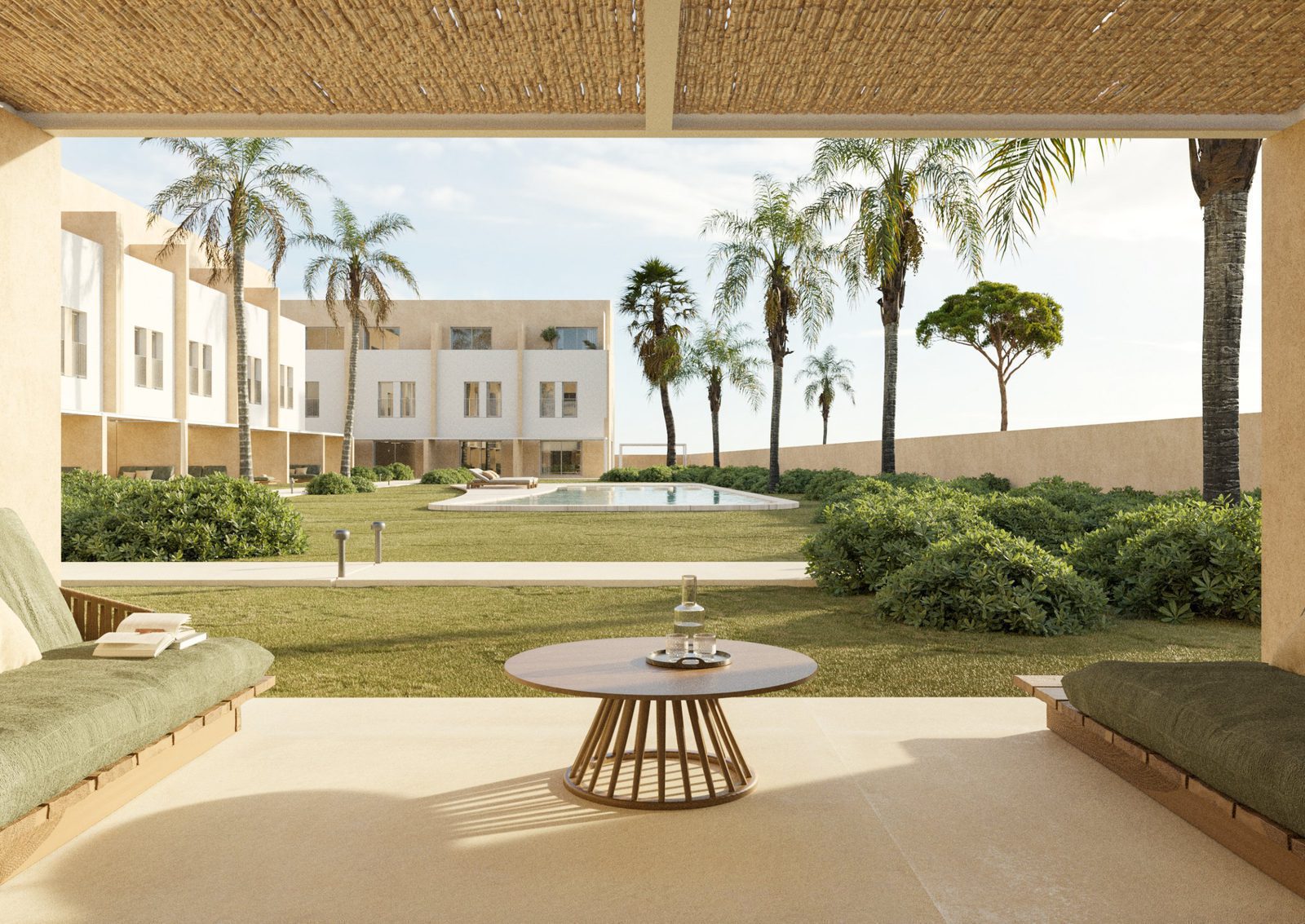 A view of the garden and pool area of a 3-bedroom townhouse in Dénia - The Estates