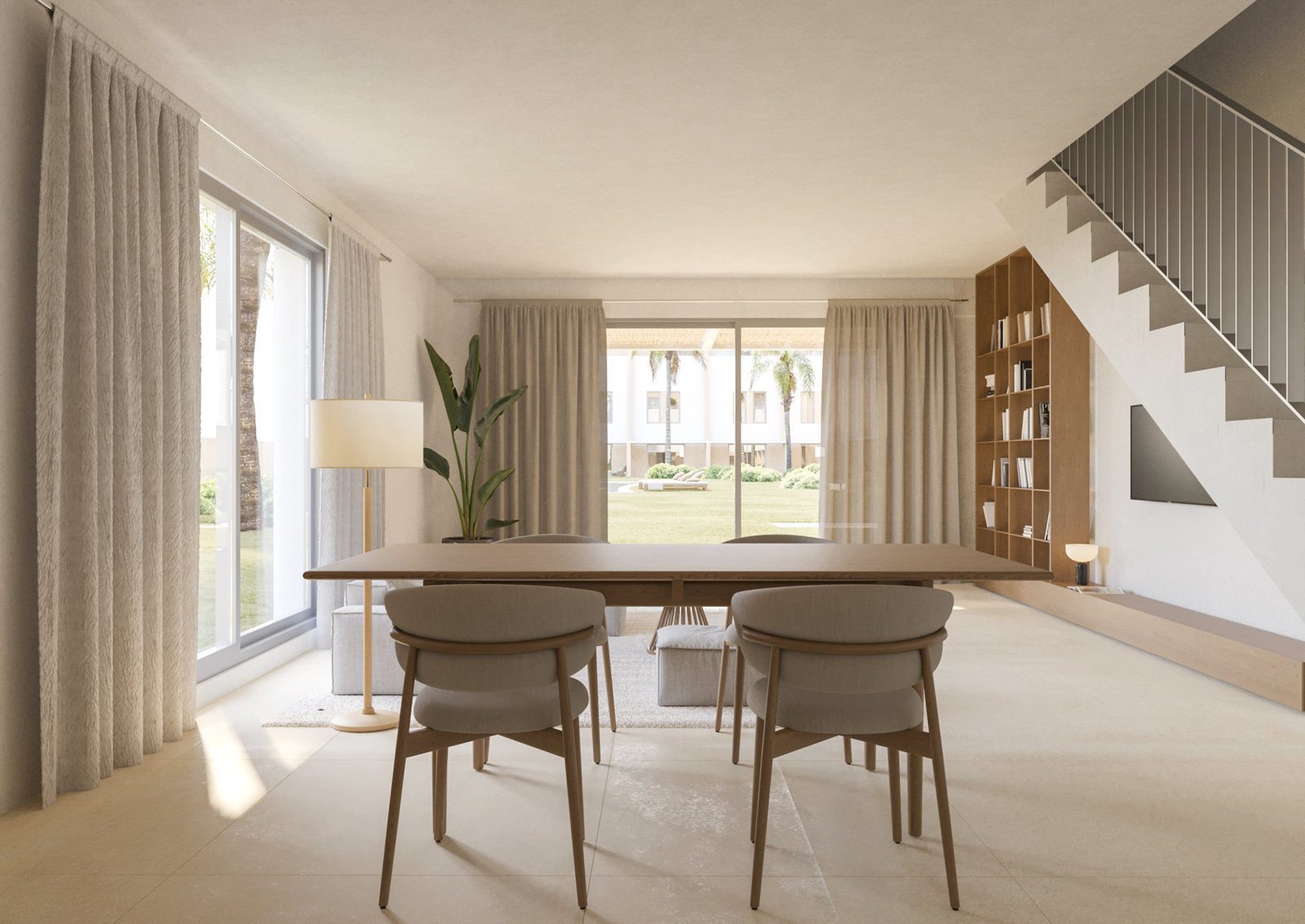 Bright living and dining area with large windows overlooking a garden in a 3-bedroom townhouse in Dénia - The Estates