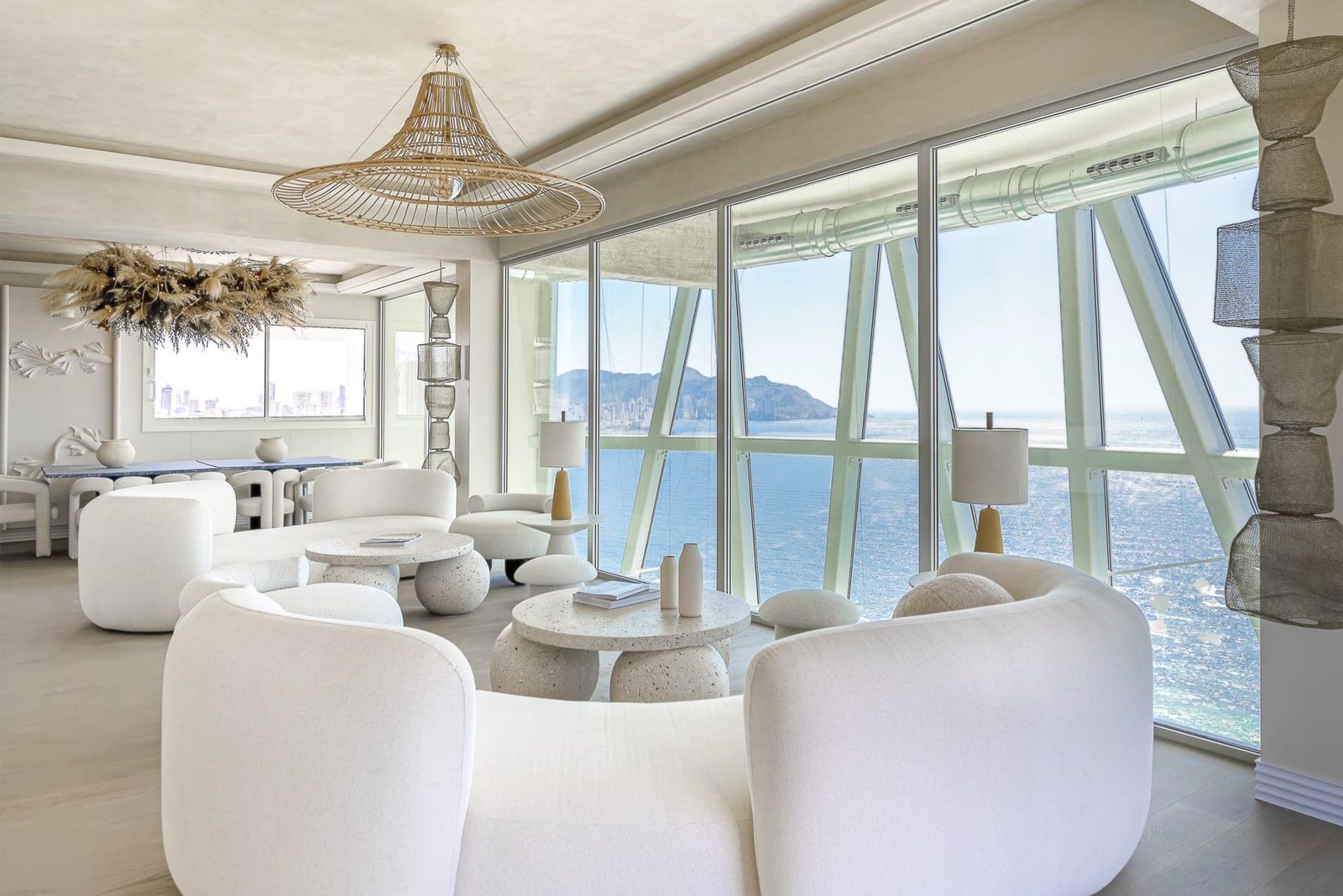 Bright open-plan living and dining area with panoramic sea views in Playa de Poniente, Benidorm - The Estates